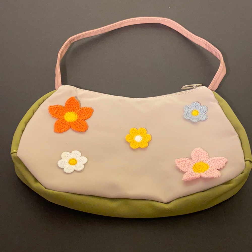 Small zip up purse with crochet detail